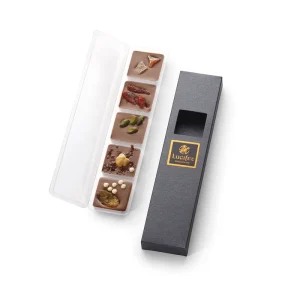 Milk chocolate brooches with colourful sprinkles